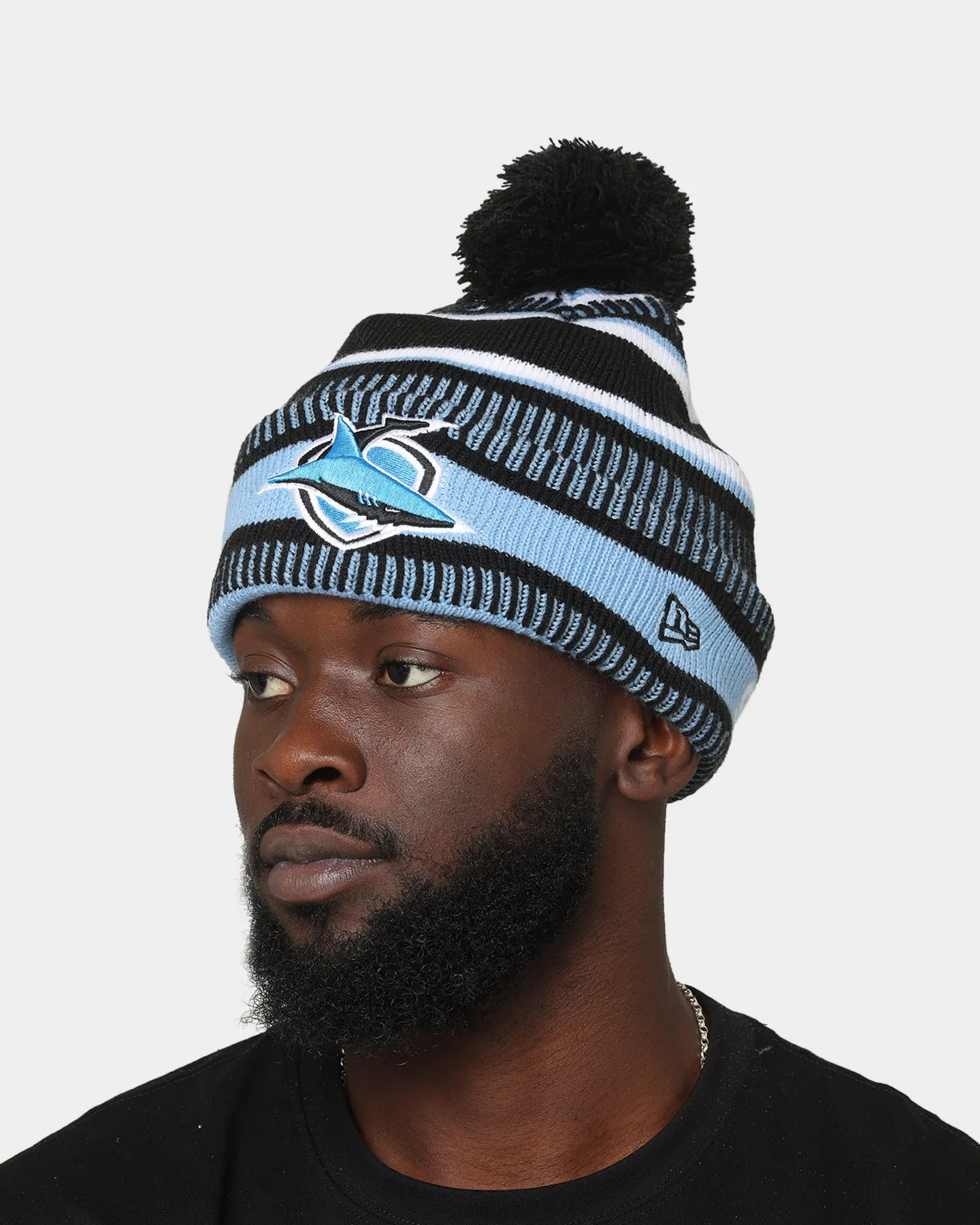 New Era Cronulla Sutherland Sharks NRL Kick Off 2022 Pom Wordmark Beanie Pastel Blue