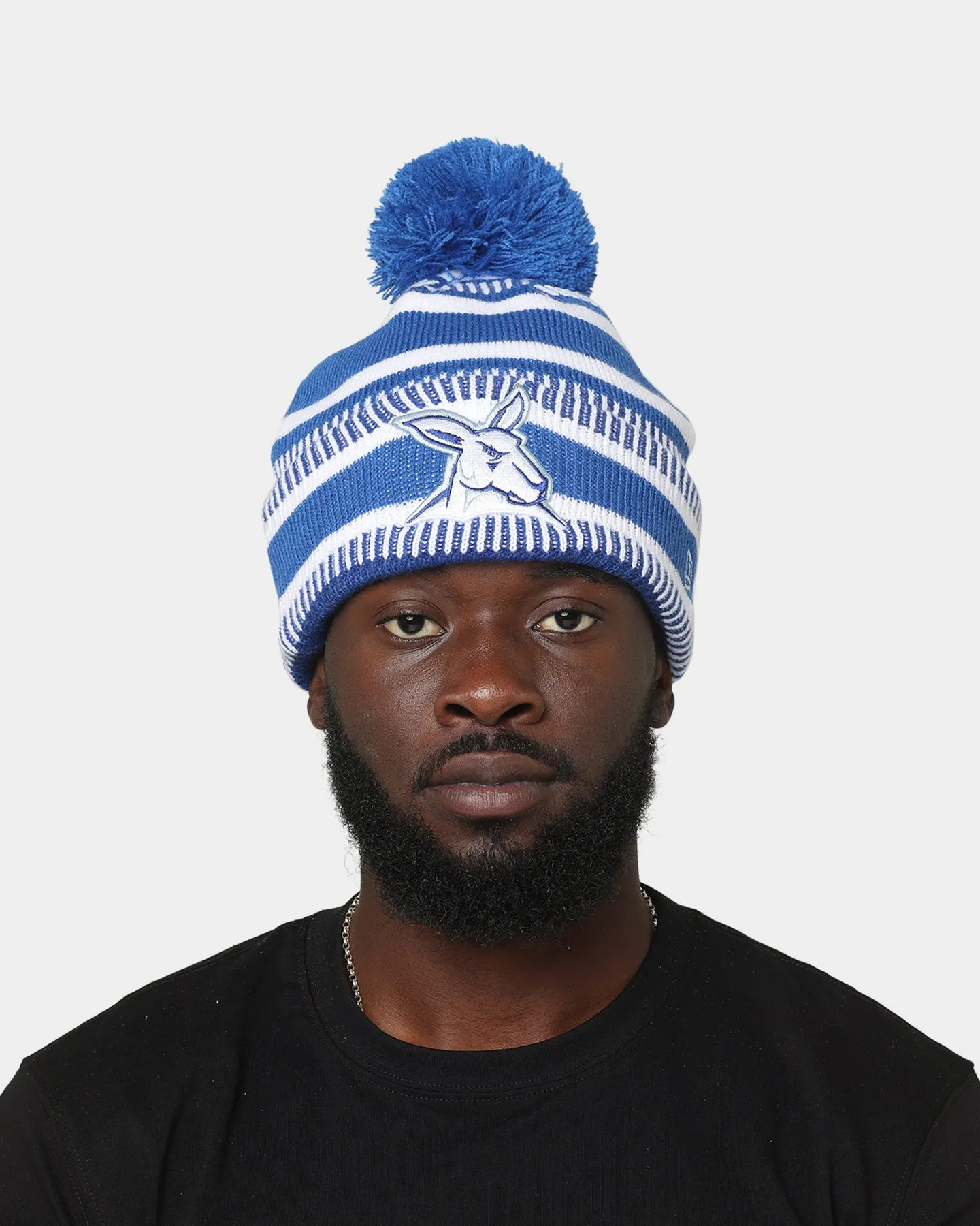 New Era North Melbourne Kangaroos AFL Opening Bounce 2022 Pom Wordmark Beanie Medium Blue