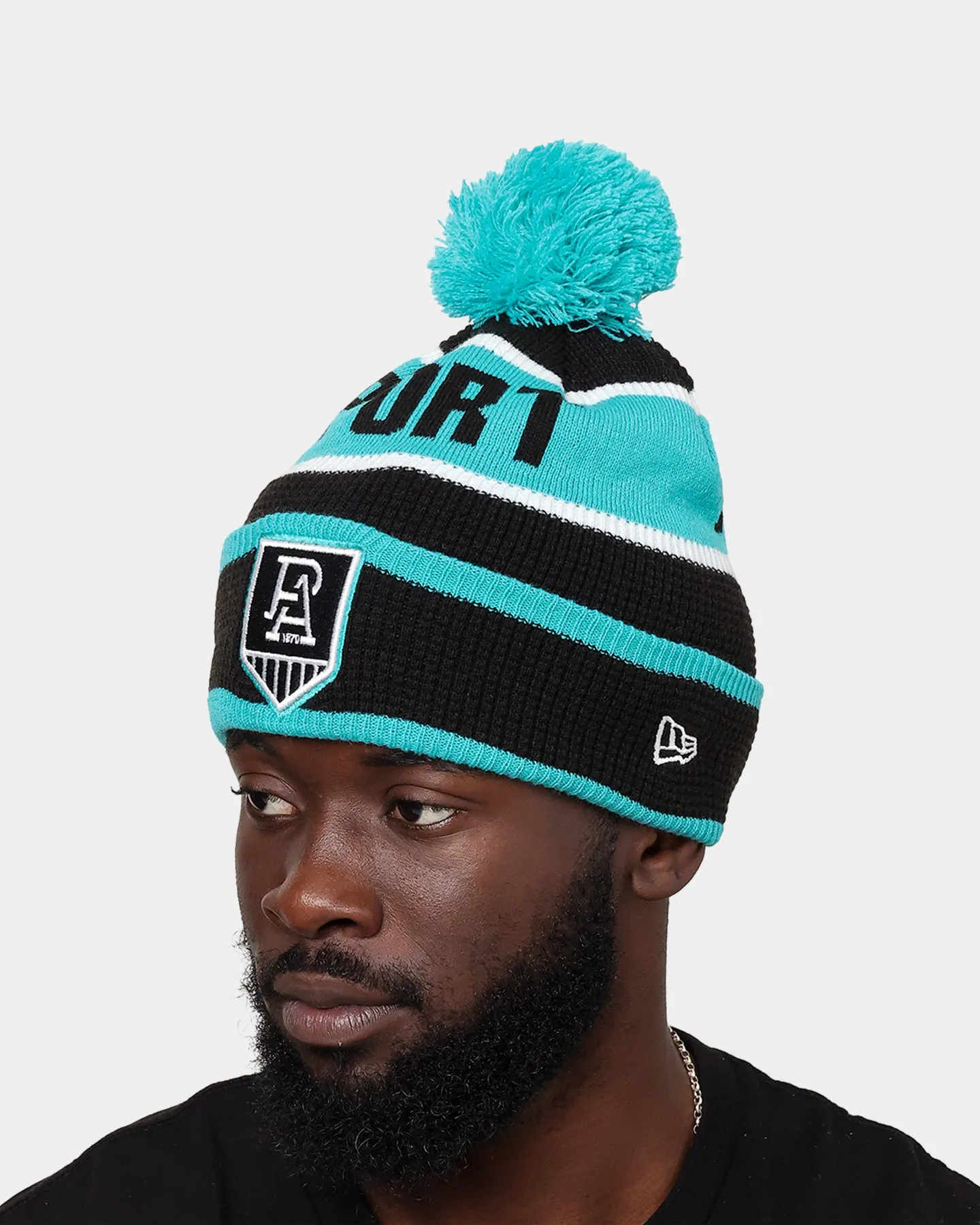 New Era Port Adelaide Power AFL Opening Bounce 2022 Pom Waffle Wordmark Beanie Black/Turquoise