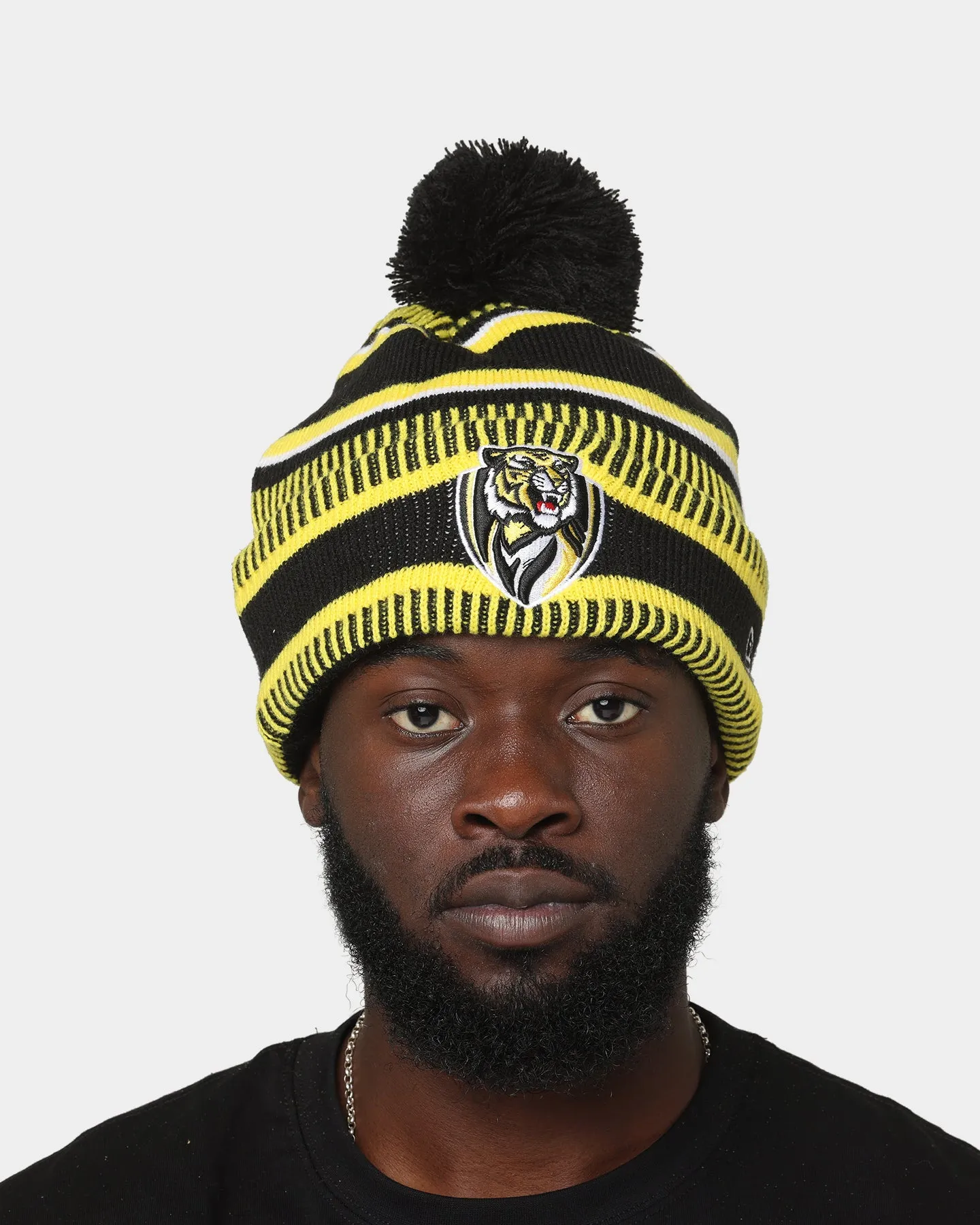 New Era Richmond Tigers AFL Opening Bounce 2022 EST Pom Wordmark Beanie Yellow