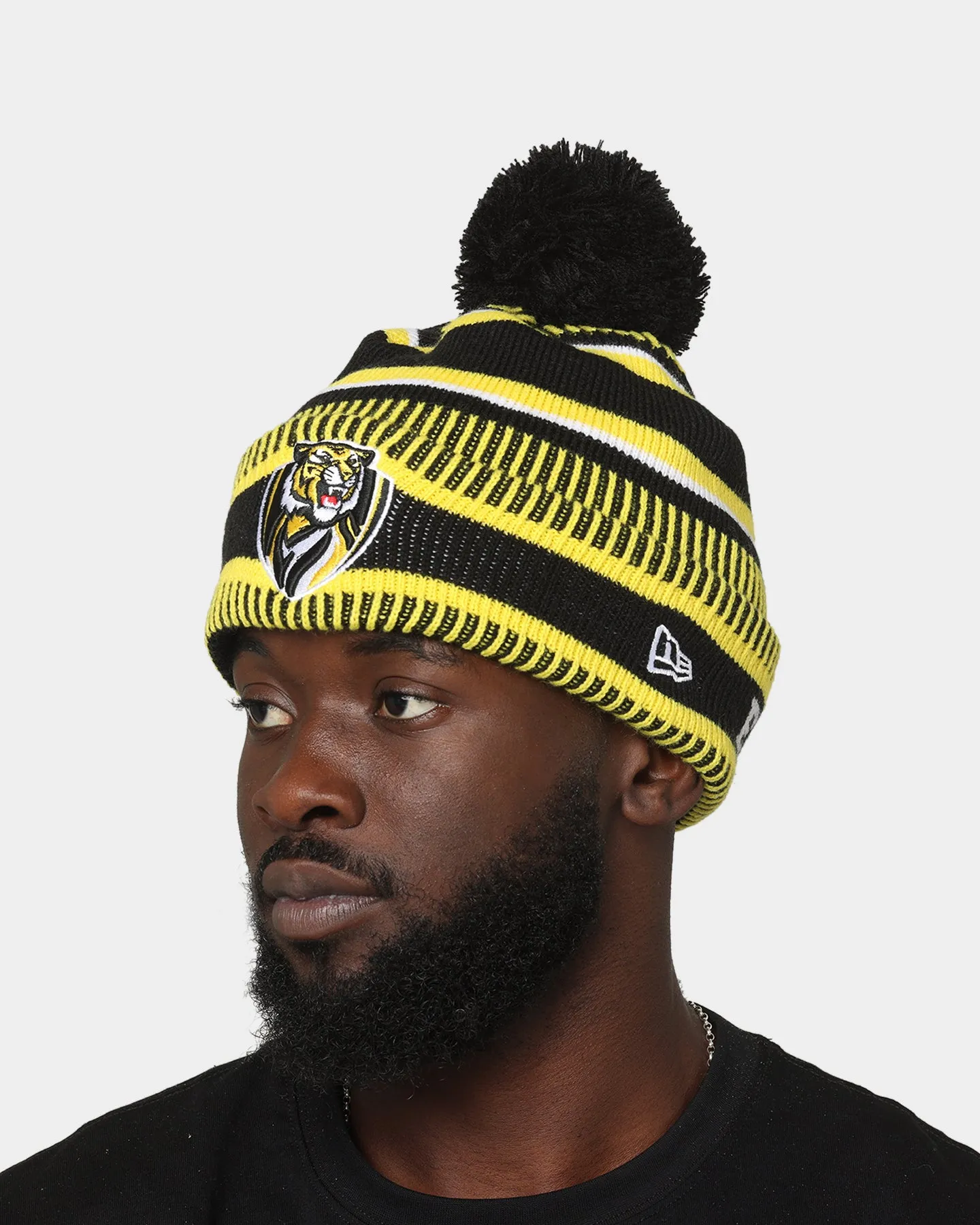 New Era Richmond Tigers AFL Opening Bounce 2022 EST Pom Wordmark Beanie Yellow