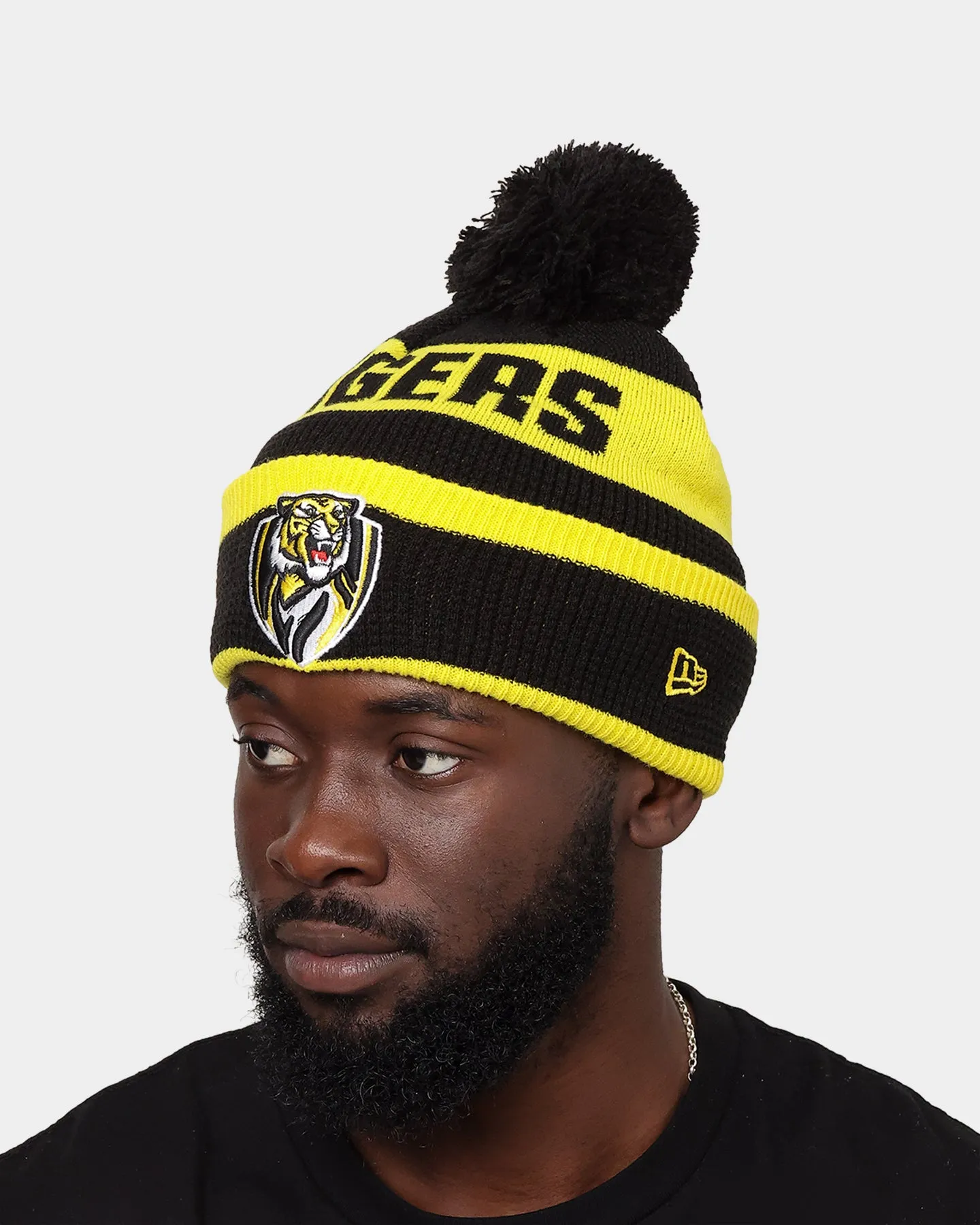 New Era Richmond Tigers AFL Opening Bounce 2022 Pom Waffle Wordmark Beanie Black/Yellow