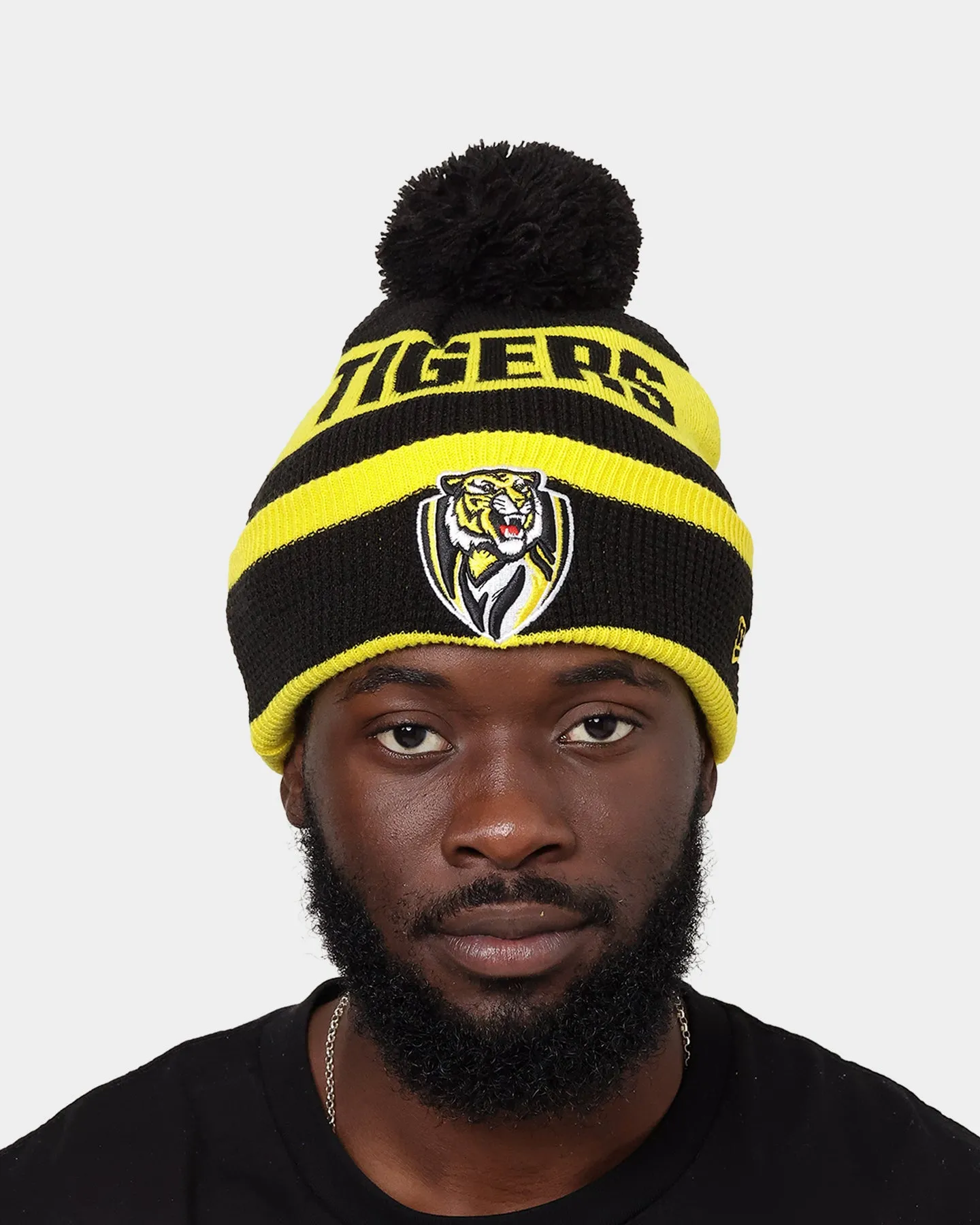 New Era Richmond Tigers AFL Opening Bounce 2022 Pom Waffle Wordmark Beanie Black/Yellow