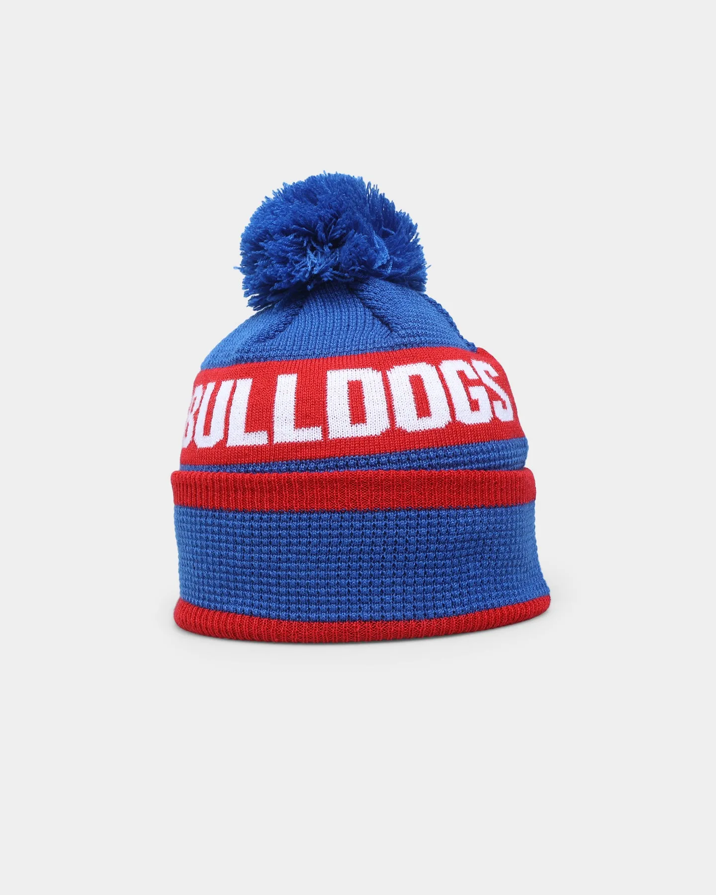 New Era Western Bulldogs AFL Opening Bounce 2022 Pom Waffle Wordmark Beanie Blue